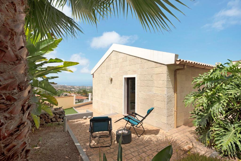 Außenbereich mit Garten und Zugang zum Ferienhaus